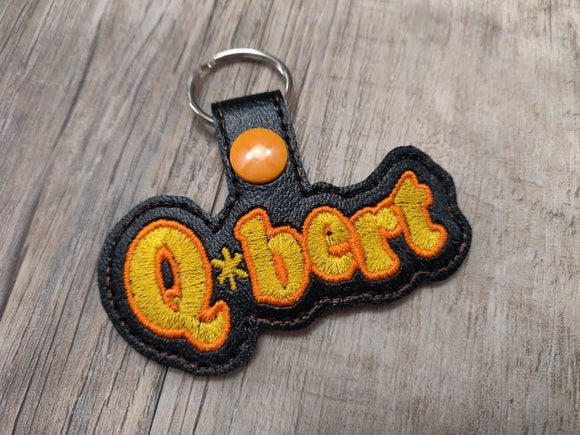 ITH Digital Embroidery Pattern for Q-bert Word Snap Tab / Key Chain, 4x4 hoop